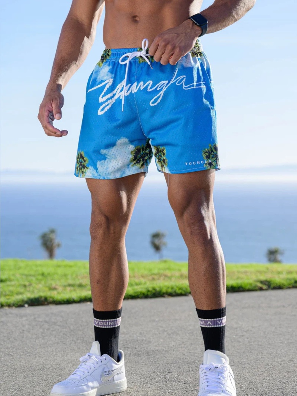 Youngla Men’s Blue Palm-Print Swim Shorts beach resort vacation